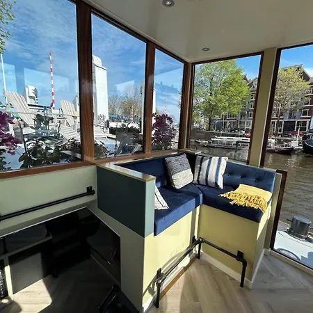 לינה וארוחת בוקר Houseboat Reussi אמסטרדם